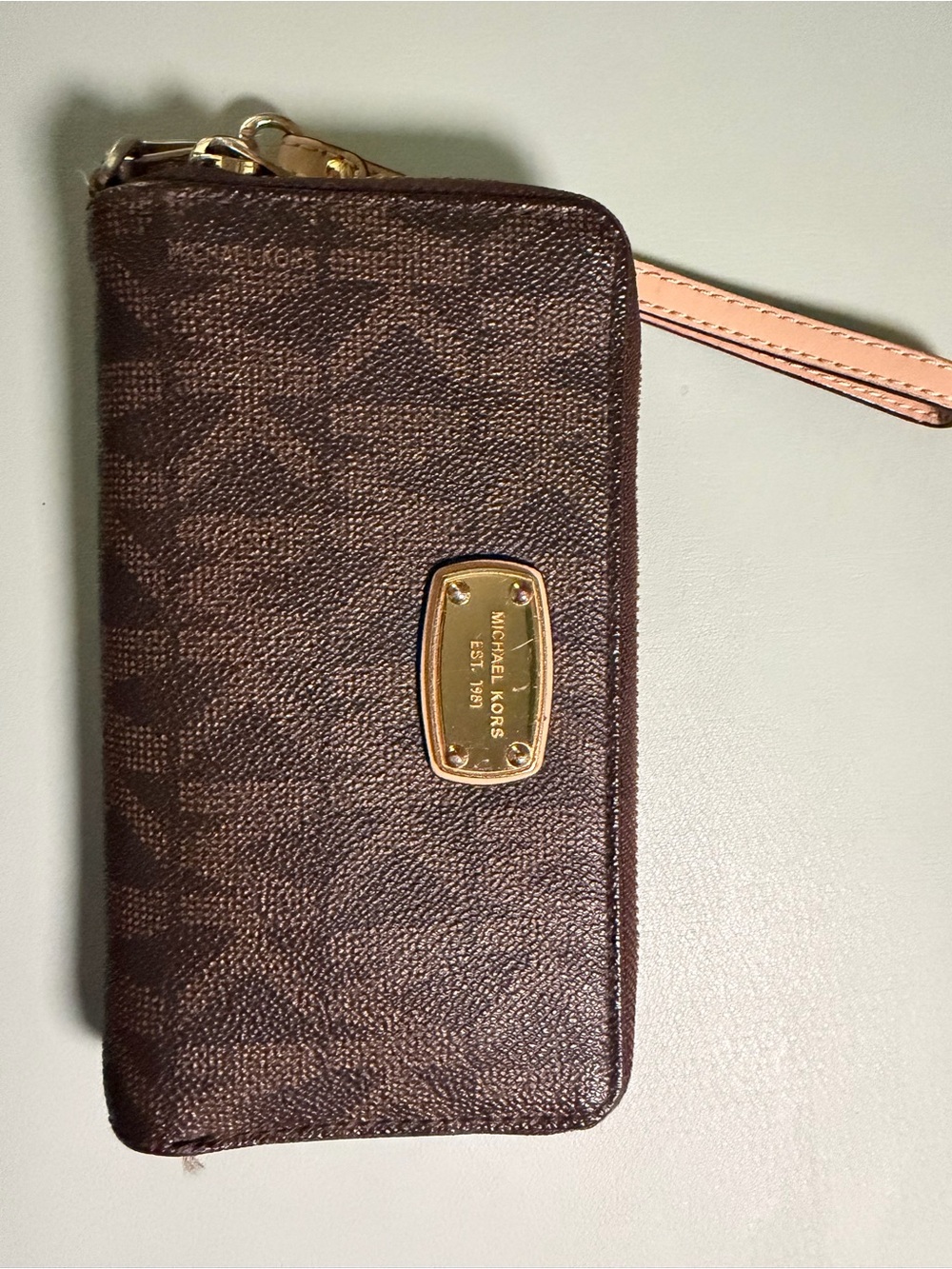 Michael Kors Brown Signature Wristlet with Blush Strap